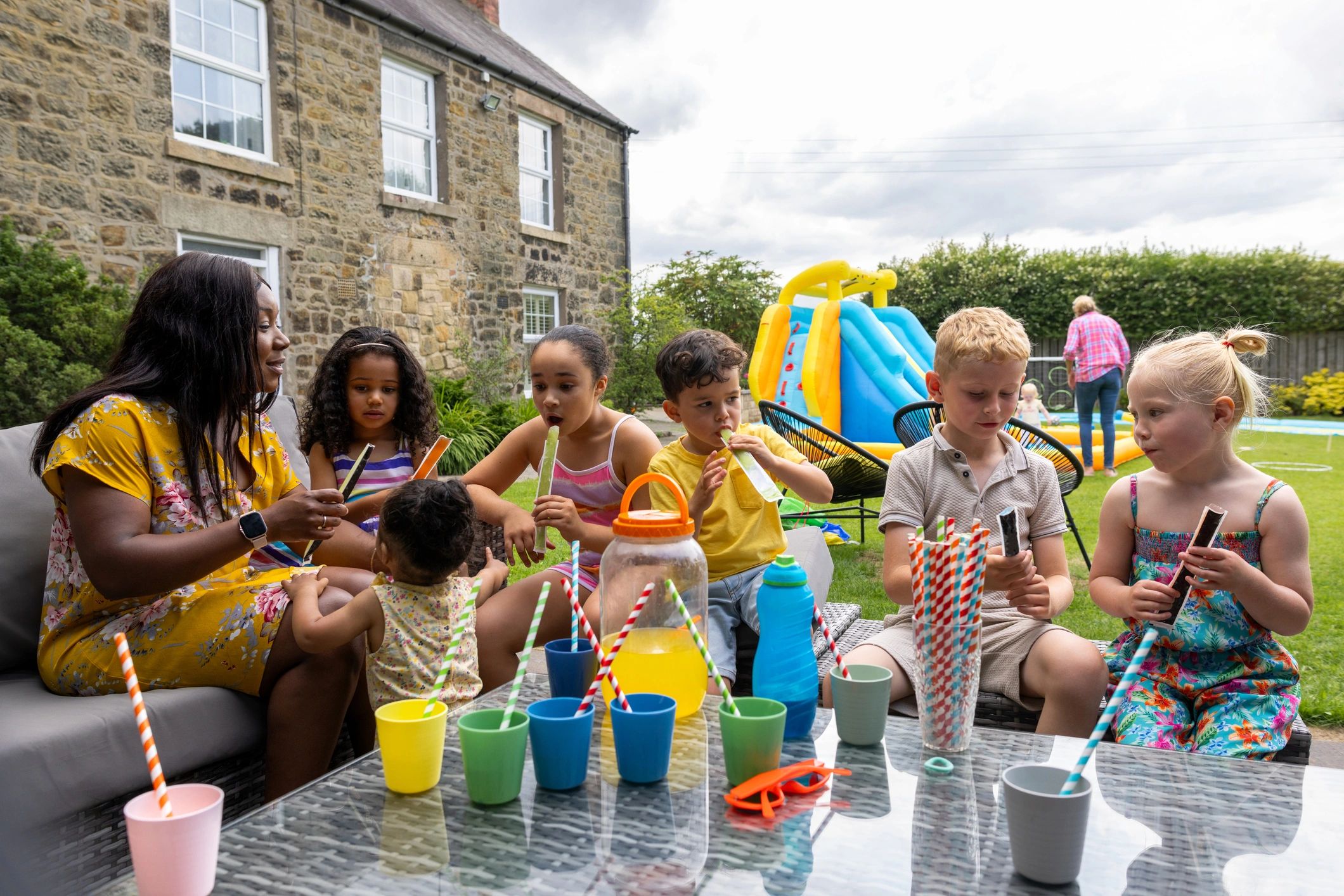 Team enjoying a cheerful party setting outdoors